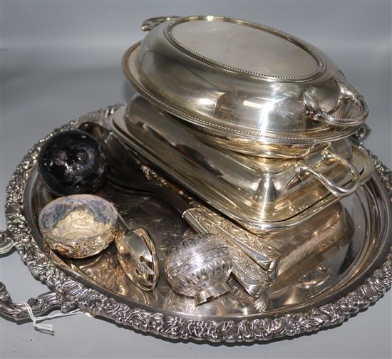A silver sauceboat, four silver cruets, a silver cruet stand and other plated items.